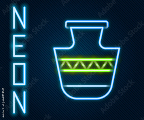 Glowing neon line Ancient amphorae icon isolated on black background. Colorful outline concept. Vector