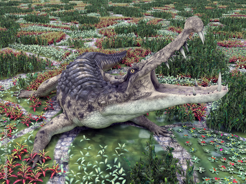 Prähistorisches Krokodil Kaprosuchus in einem Garten © Michael Rosskothen