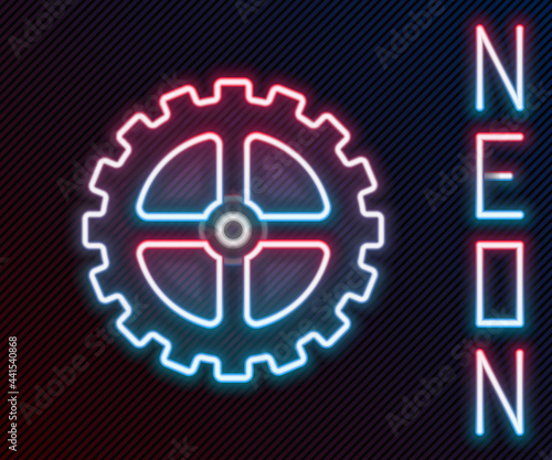 Glowing neon line Bicycle sprocket crank icon isolated on black background. Colorful outline concept. Vector