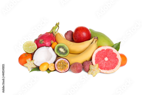Pile of different exotic fruits on white background