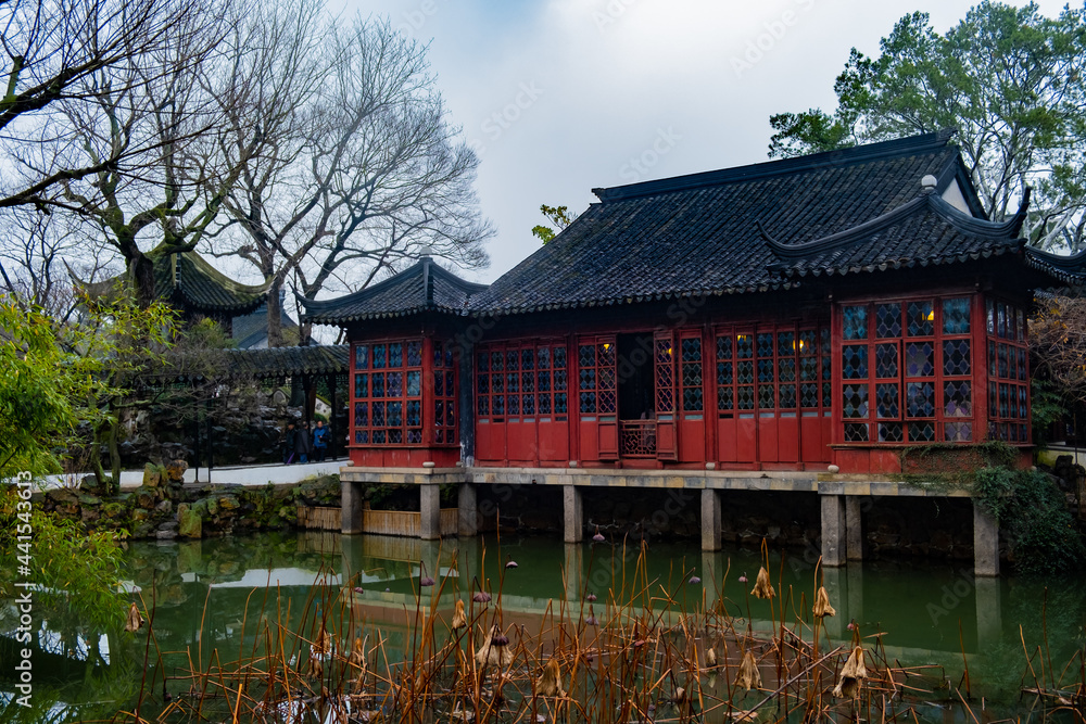 red wooden wall pavilion in the Suzhou garden, interesting place to visit , travel, rest, meditation