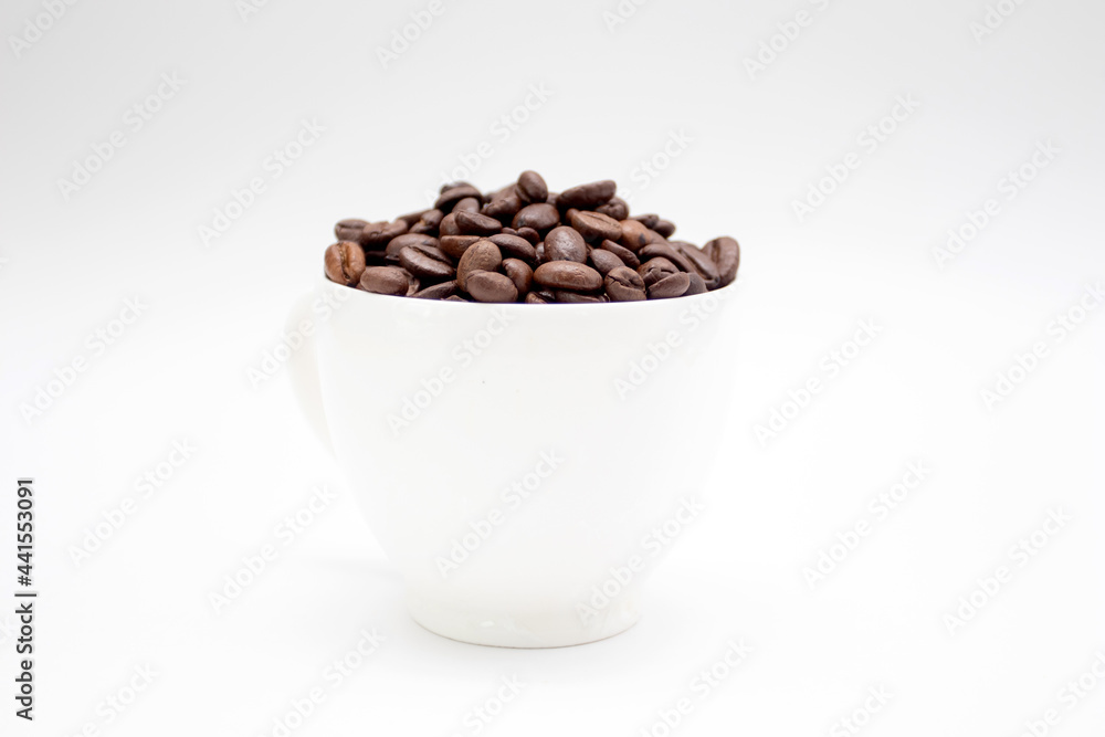 Coffee cup with Roasted coffee beans on white background Coffee cup with Roasted coffee beans on white background