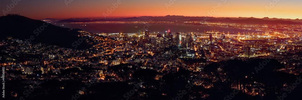 Golden hour panoramic of a winter sunrise over Cape Town in South Africa.