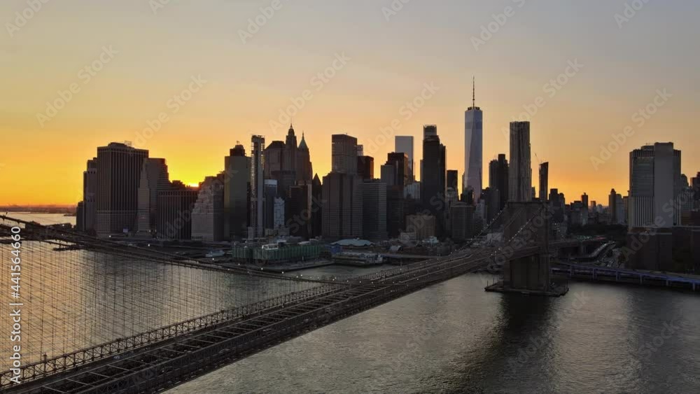 Brooklyn Bridge Manhattan sunset beautiful cityscape over East River at New York USA Brooklyn Bridge Manhattan sunset beautiful cityscape over East River at New York USA