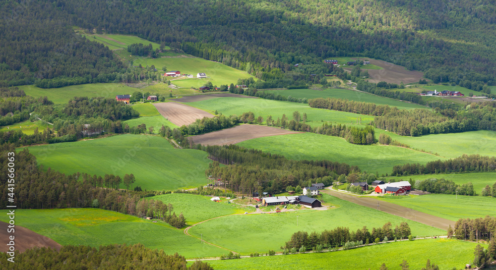 Areal view of a rural landscape with farms and forests in Gudbrandsdalen, Norway