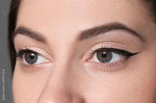 Beautiful woman with black eyeliner, closeup view