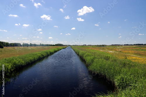 meadows, roads and canals in water storage Eendragtspolder in Zevenhuizen photo