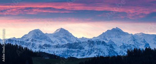 Eiger Mönch and Jungfrau at sunrise on a winter morning © schame87