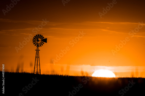 Windmill in countryside at sunset, Pampas, Patagonia,Argentina.