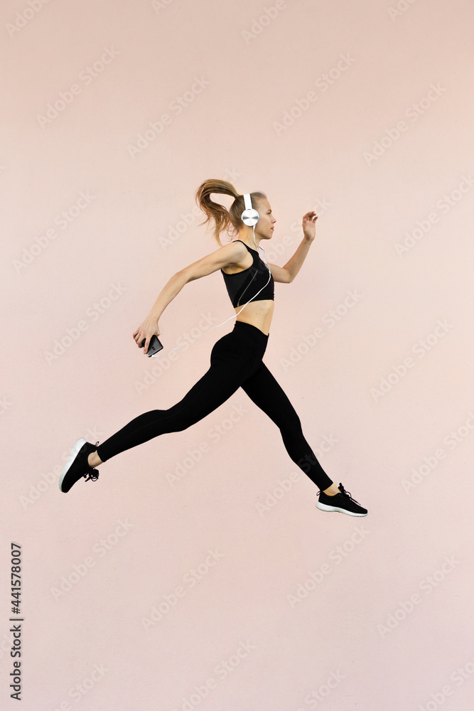 Young woman working out outdoors Young woman working out outdoors