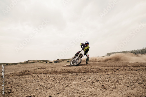 Fototapeta Naklejka Na Ścianę i Meble -  Motorcyclist  at enduro motocross training ground