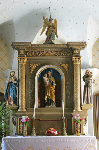 The altar of Saint Joseph in the parish church of the Holy Trinity in Radoboj, Croatia photo