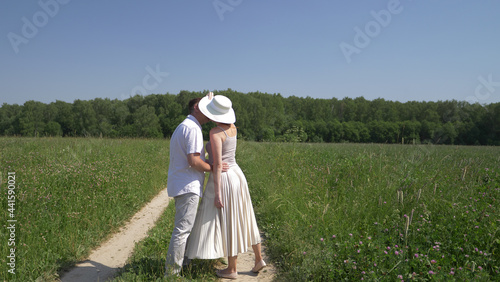 Lovers walk in the field