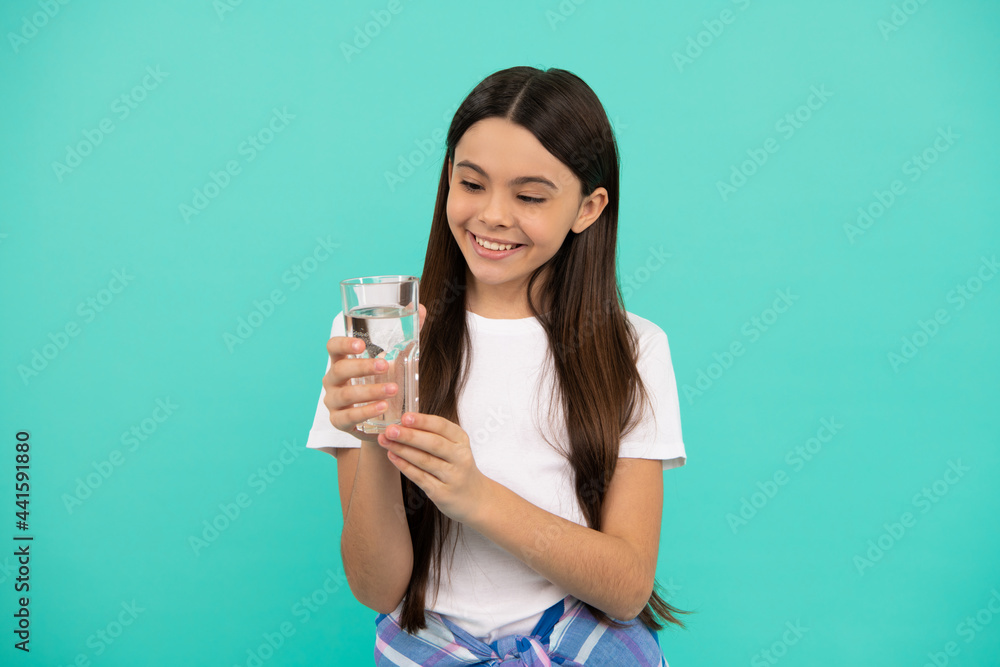 water balance in body. drinking per day. hydration vitality. be hydrated. kid hold glass of water water balance in body. drinking per day. hydration vitality. be hydrated. kid hold glass of water