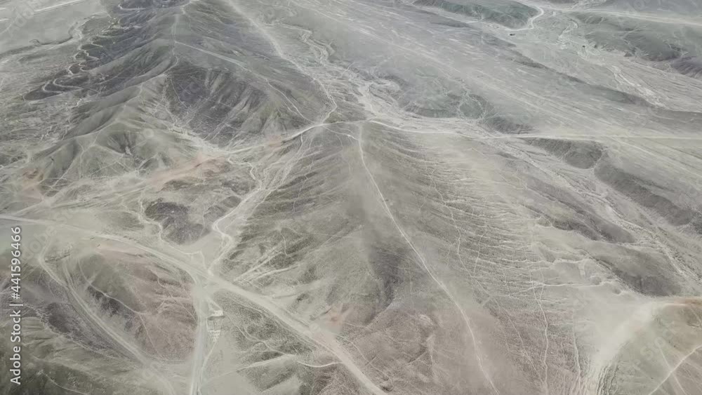 Geoglyphs and lines in the Nazca desert. UNESCO World Heritage Site - Peru, South America (aerial photography) Geoglyphs and lines in the Nazca desert. UNESCO World Heritage Site - Peru, South America (aerial photography)