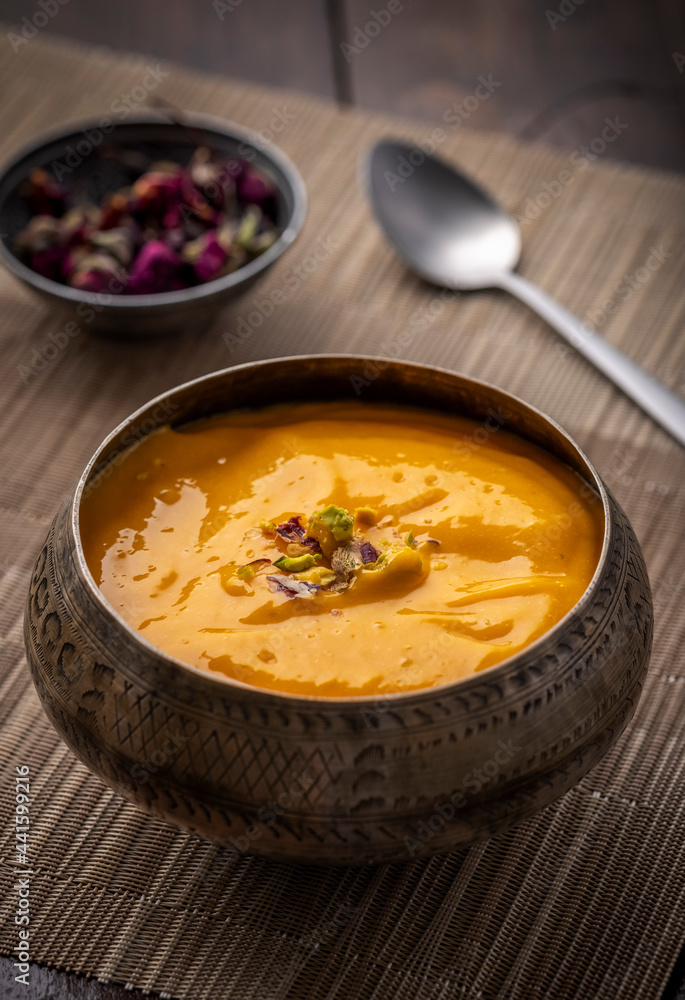 Mango Pulp / Aam rus or Ras served in small bowls Mango Pulp / Aam rus or Ras served in small bowls