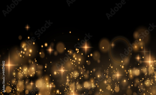 Gold sparkling dust with gold sparkling stars on a transparent background. Glittering texture. Christmas effect for luxury greeting rich card. 