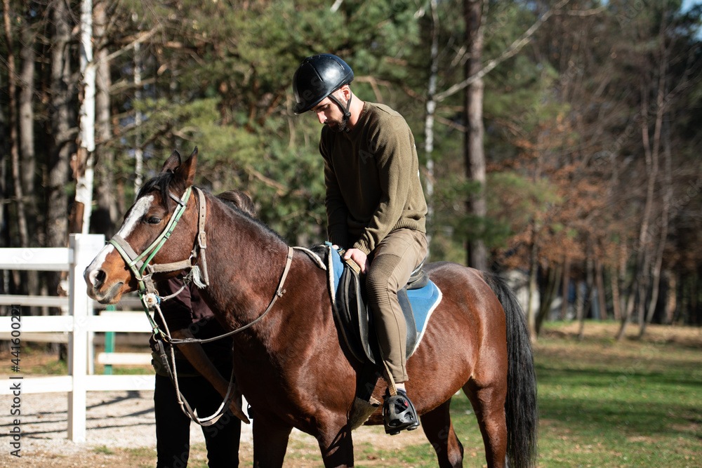 Riding Man Is Training His Horse Riding Man Is Training His Horse