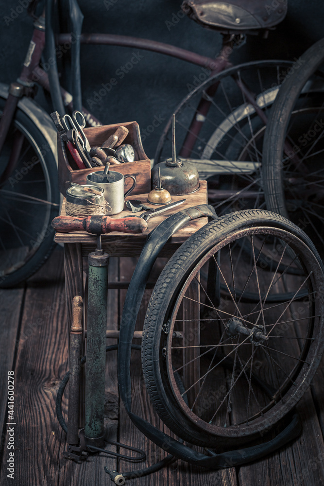 Fototapeta premium Small bicycle repair workshop with spare parts. Repair shop