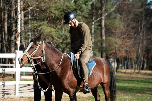 Riding Man Is Training His Horse