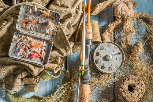 Handmade fishing equipment with rod and lures. Fishing preparation