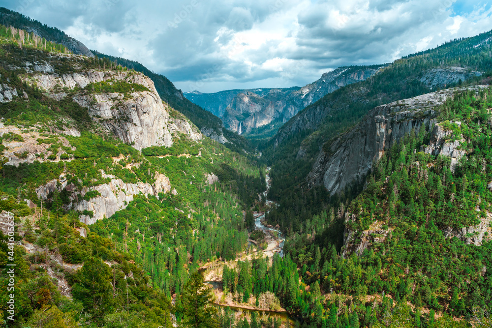 A winding river flowing in the mountains, photographed from above in Yosemite National Park, California.