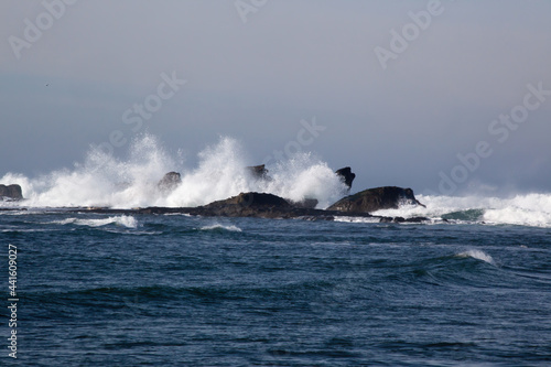 Ocean Waves Splashing on rocks at the shore