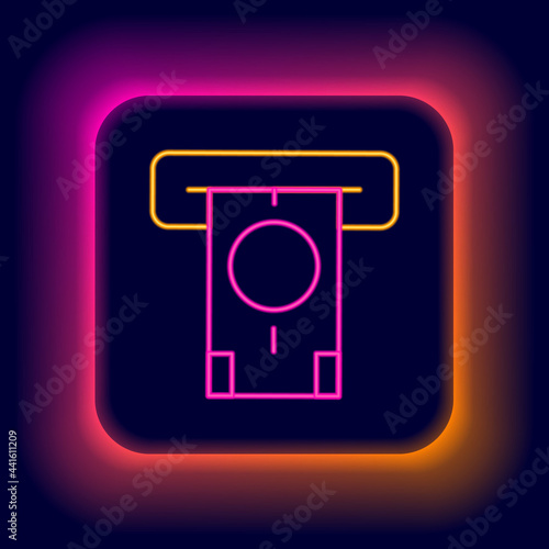 Glowing neon line ATM - Automated teller machine and money icon isolated on black background. Colorful outline concept. Vector