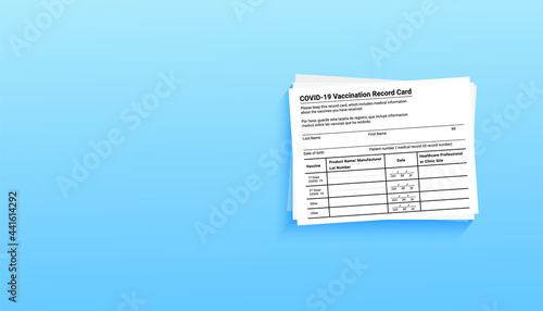 Coronavirus vaccination record card on blue background with copy space for travel and movement without borders. Vaccination form during the coronavirus covid 19 epidemic