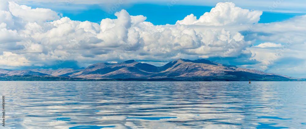 A panorama view from a boat across the Firth of Lorn near to Oban, Scotland on a summers day