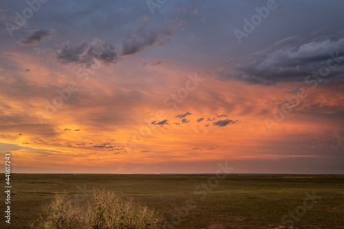 spectacular sunset sky over a green prairie - Pawnee National Grassland in Colorado, aerial view of late spring or early summer scenery © MarekPhotoDesign.com