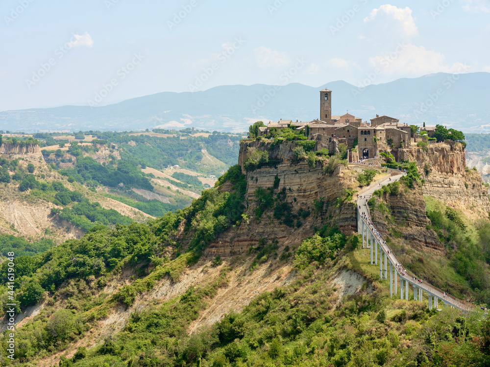 Fototapeta premium Civita di Bagnoregio, city of culture, located in the valley of the badlands. City of Etruscan origin, also known as 