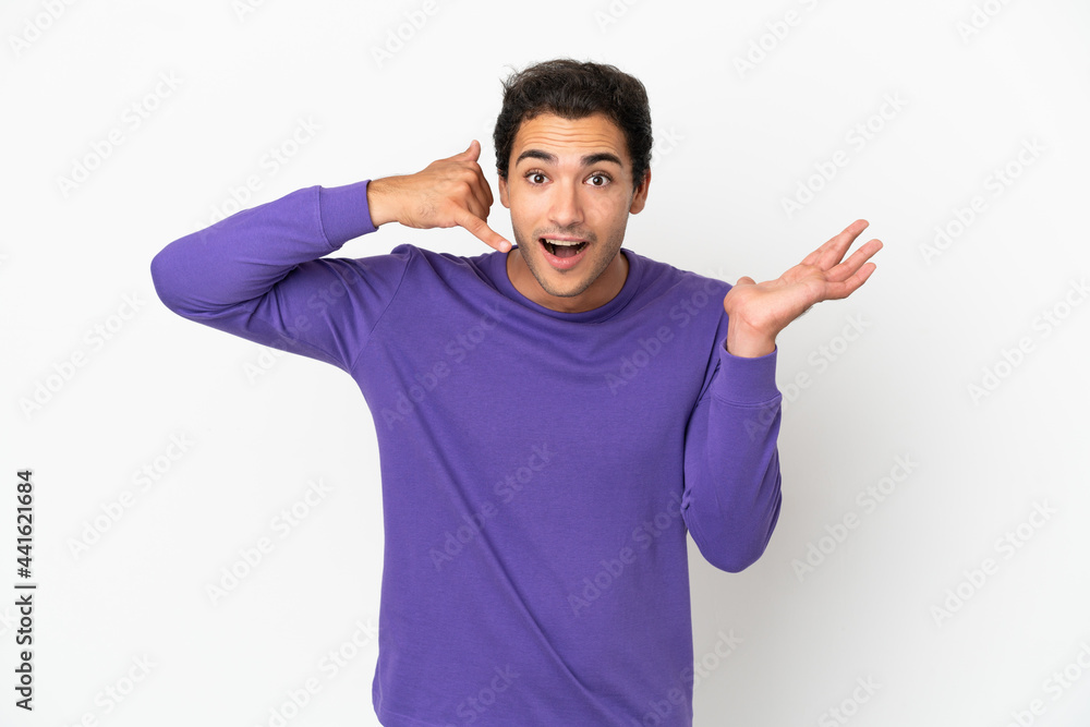 Caucasian handsome man over isolated white background making phone gesture and doubting Caucasian handsome man over isolated white background making phone gesture and doubting
