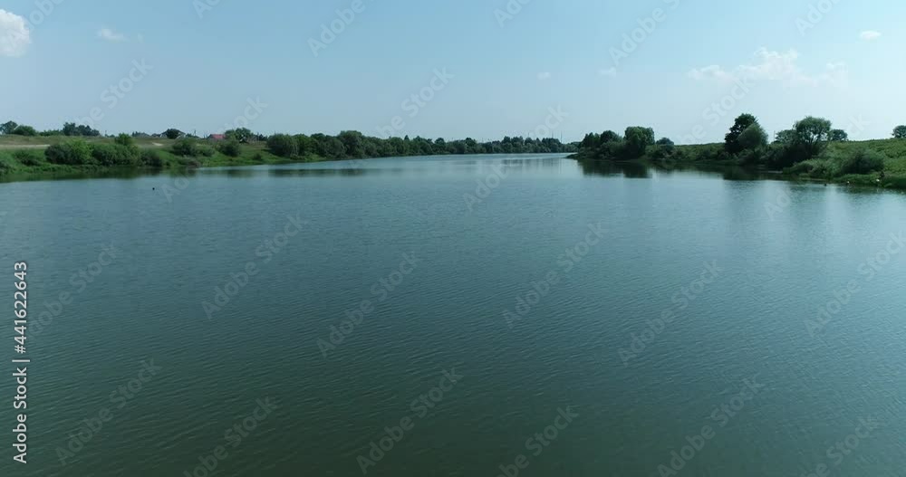 Aerial video of the river on a sunny summer day Aerial video of the river on a sunny summer day