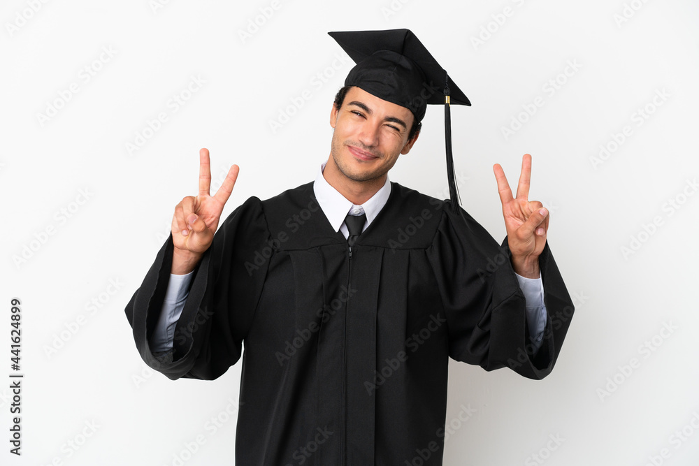 Young university graduate over isolated white background showing victory sign with both hands Young university graduate over isolated white background showing victory sign with both hands