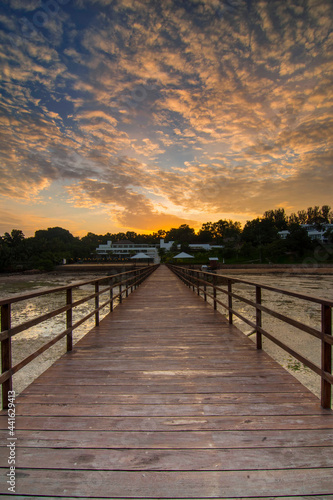 Beautiful Sunrise  on sea  with  pier  for foreground  in batam island © Dwi