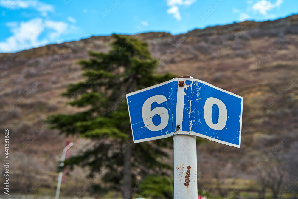 Car road sign on a mountain road Car road sign on a mountain road