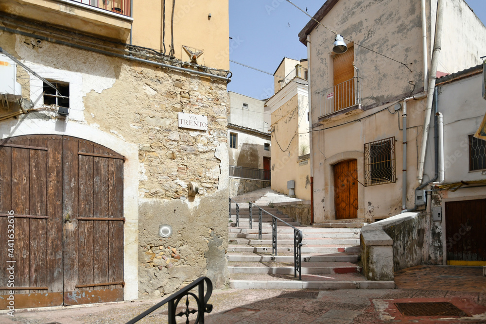 A narrow street in Candela, an old town in the Puglia region of Italy.