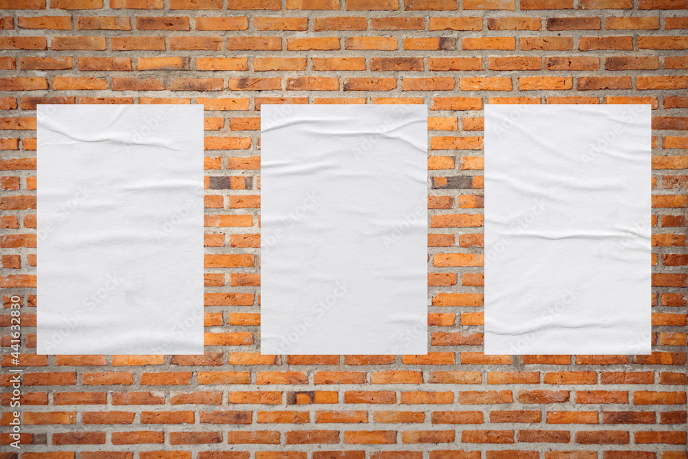 Blank white wheatpaste glued paper poster mockup on brick wall background  Stock Photo | Adobe Stock
