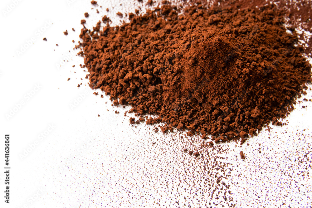 instant coffee granules on white floor instant coffee granules on white floor