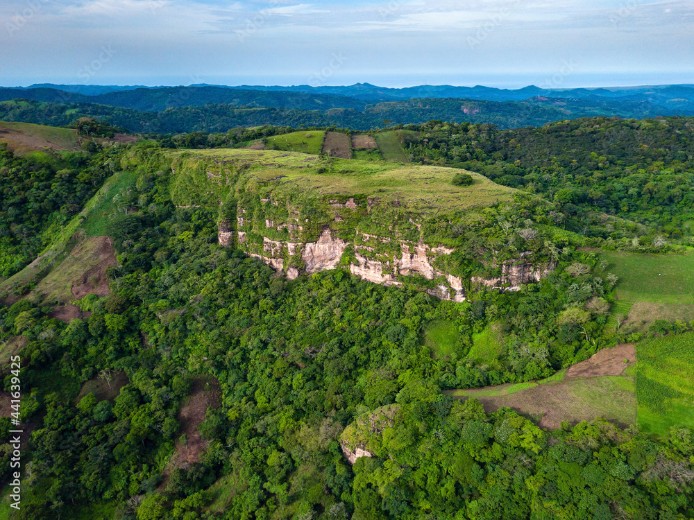 An aerial view of a natural rock formation plateau in El Salvador, Central America