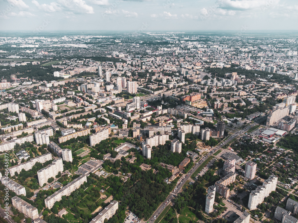 Aerial panoramic cityscape view on green summer Kharkiv city center, klochkivska street. Multistory modern high residential buildings on bright sunny day