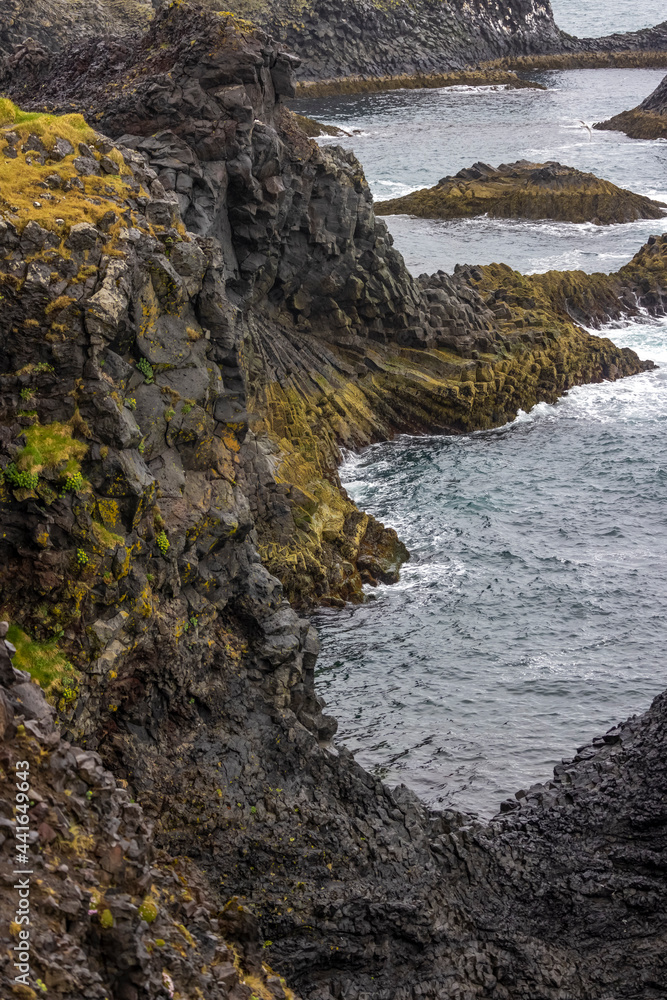 Basalt rock formations at west coast in Iceland near Arnarstapi Basalt rock formations at west coast in Iceland near Arnarstapi