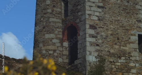 Old stone engine house of Tywarnhayle Mine in Cornwall, slow slider photo