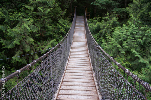 Fototapeta Naklejka Na Ścianę i Meble -  Suspension bridge in Lynn Canyon Park, British Columbia. North Vancouver, Canada.