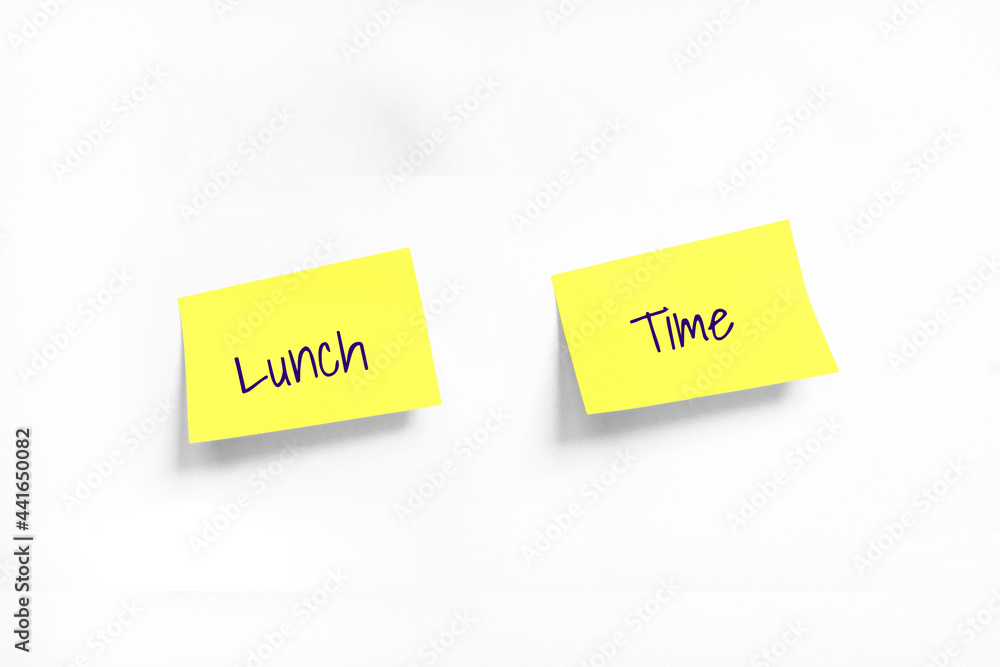 Lunch Time Handwriting text on two Yellow stickers on white Whatman paper. Concept of learning, work, programming, testing, business. Handwriting text, copy space Lunch Time Handwriting text on two Yellow stickers on white Whatman paper. Concept of learning, work, programming, testing, business. Handwriting text, copy space