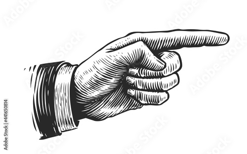 Hand with pointing finger. Illustration drawn in vintage engraving style photo