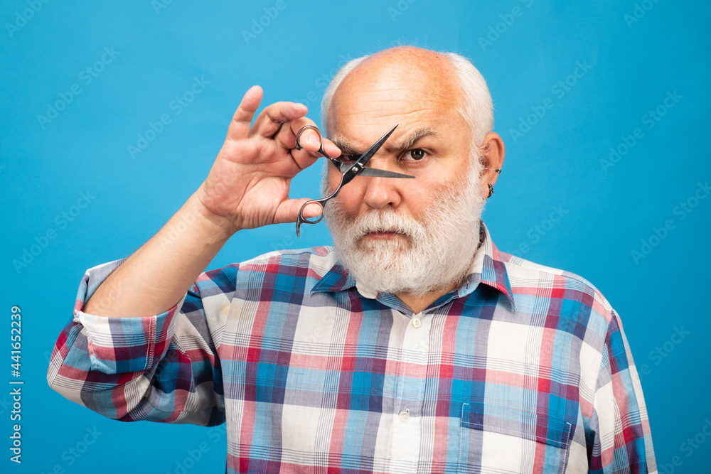 Barber scissors. Portrait of old bald man bearded man with grey moustache beard. Barber scissors. Portrait of old bald man bearded man with grey moustache beard.