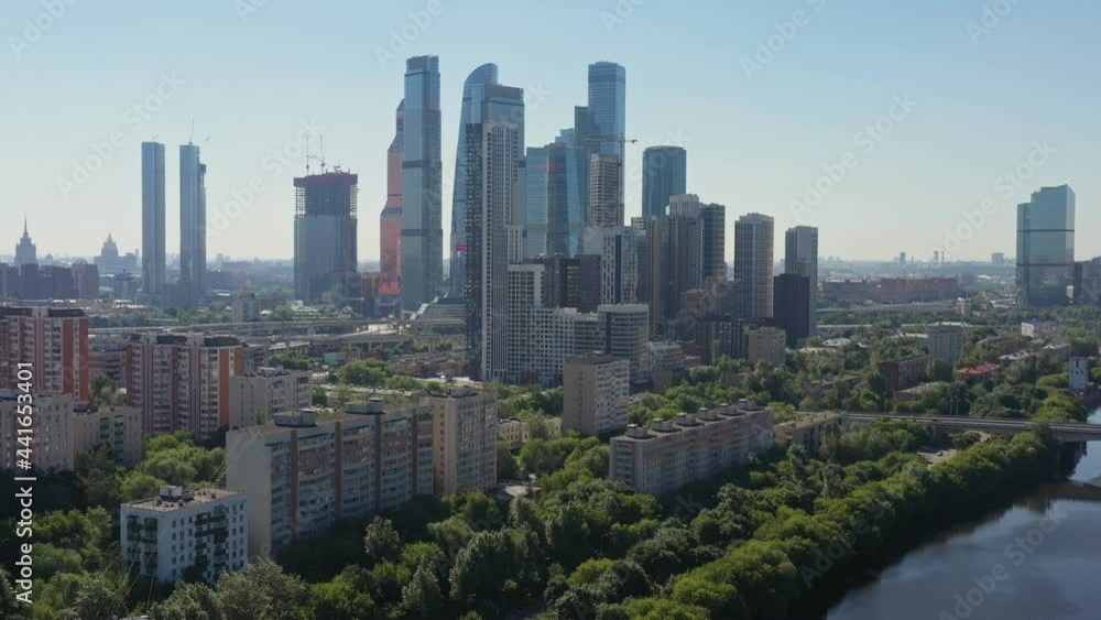 view of the famous business center-Moscow city across the river at dawn. view of the modern city of Moscow. aerial view view of the famous business center-Moscow city across the river at dawn. view of the modern city of Moscow. aerial view