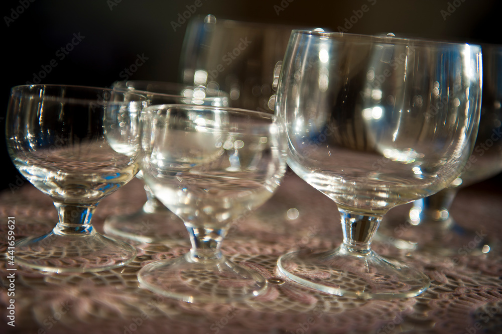 Empty glasses closeup in the table background. High quality photo Empty glasses closeup in the table background. High quality photo